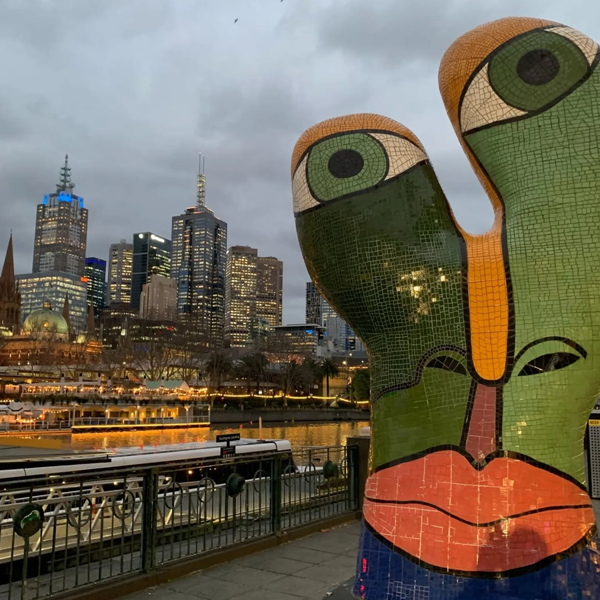 melbourne skyline with public art at night